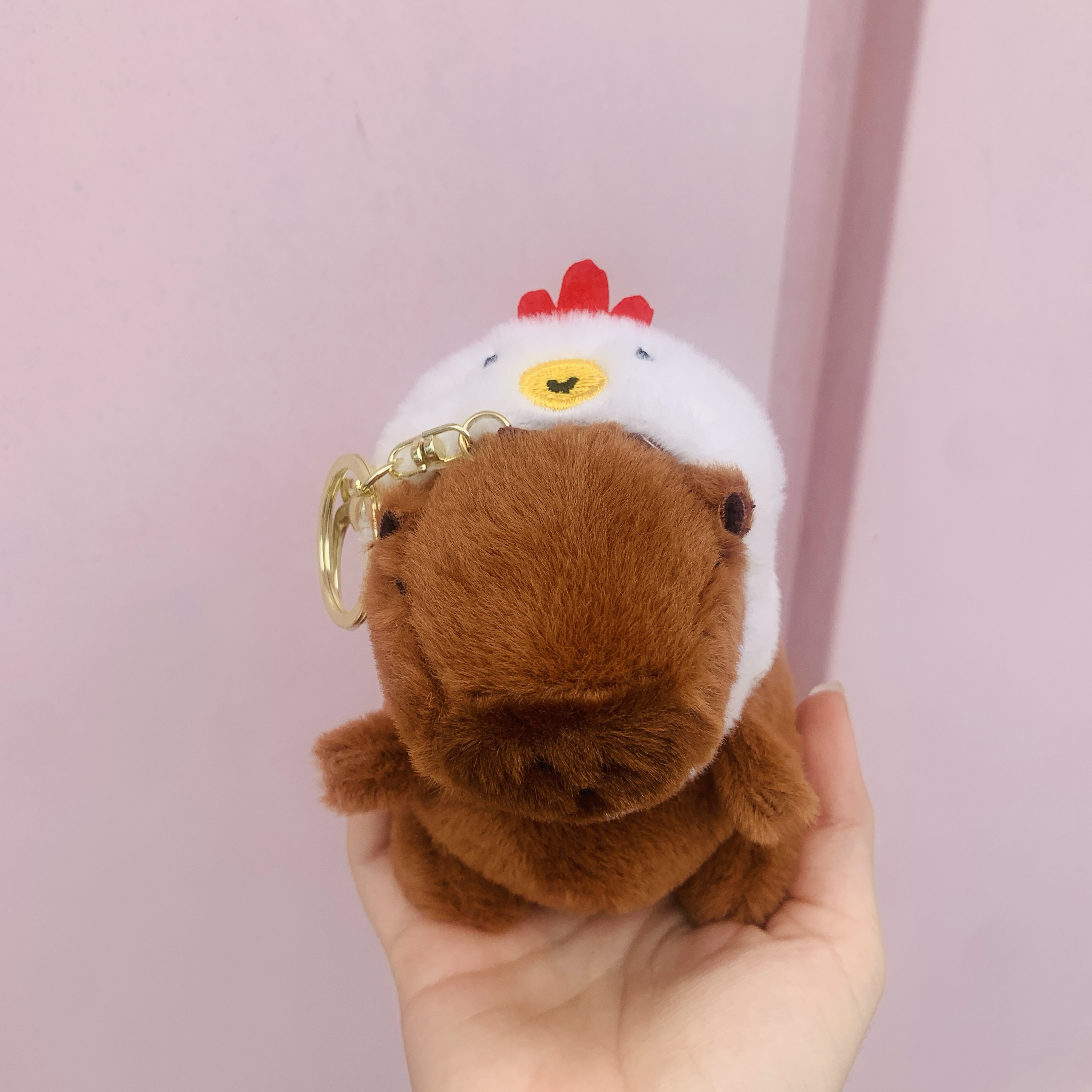 Chaveiro pelucia capivara touca